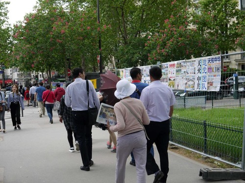 Posters and banners near Eiffel Tower