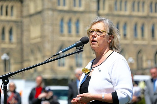 During an interview at the event, Hon. Elizabeth May said, “Truthfulness and Compassion and Forbearance are wonderful principles for the whole world,” and “Any principles such as these are most welcome in Canada.”