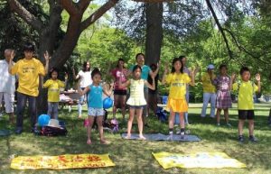 Young Falun Gong practitioners are demonstrating the exercises.