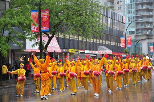 The rain did nothing to dampen the spirits of the waist drummers.