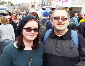 Paul Martin and his daughter took in the parade together. Paul said, “I'm enjoying Falun Dafa's procession very much. They carry a good and strong energy field. The music is lyrical, relaxing and pleasant to the ears.”