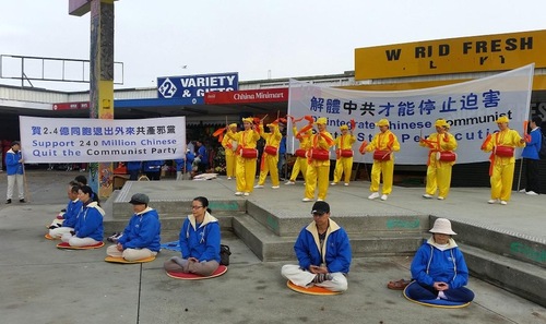 Group meditation and banners supporting over 240 million Chinese who have quit the Chinese Communist Party and its youth organizations.