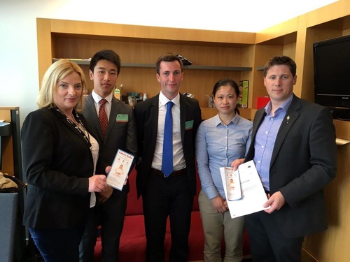 High school student Li (second from left) and two other Falun Gong practitioners from Ireland visit MEP Liadh Ni Riada (first from left) and Matt Carthy (first from right).