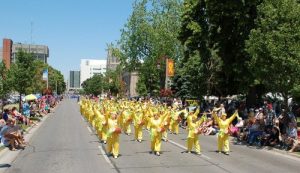 The Falun Dafa Divine Land Marching Band and Waist Drum Team in the Father’s Day Fiesta Parade in Oshawa on June 19th.