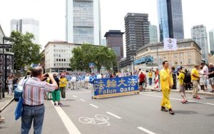 The Divine Land Marching Band led the Falun Dafa group in the parade.