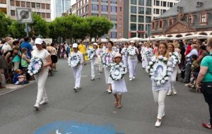 Practitioners carry the portraits of some of the over 4,000 practitioners in China who died as a result of torture in police custody.