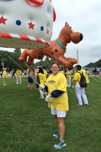 Sue McInturf helps out to show her support for Falun Gong.