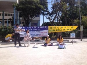 Practitioners re-enact tortures that Falun Gong practitioners face in China's jails.