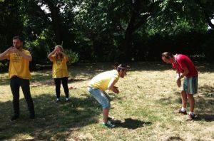 A man learns the Falun Gong exercises in a park.