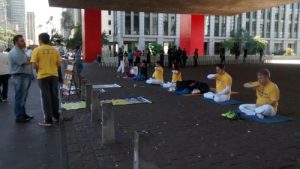 Demonstrating the exercises in front of the São Paulo Museum of Art (MASP)