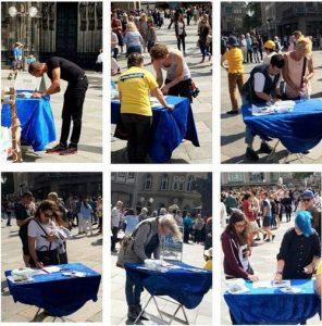 Collecting petition signatures in front of the Cologne Cathedral.