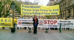 Press conference in front of Sydney Town Hall for the car tour, which kicked off on August 29, 2016, calling for the public's attention to the persecution of Falun Dafa in China and help to end it.