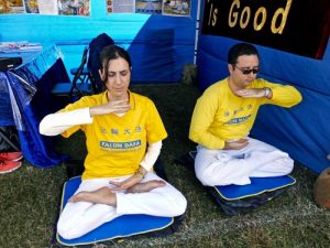 Falun Dafa practitioners demonstrating the meditation exercise.