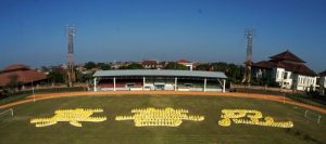 Forming the Chinese characters for “Truthfulness-Compassion-Forbearance" at Ngurah Rai Stadium, Denpasar, Indonesia.