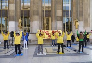 Practitioners demonstrate the Falun Gong exercises on Human Rights Square in Paris, France.