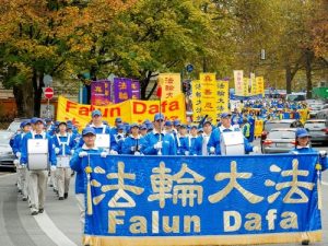 Nearly one thousand Falun Gong practitioners march in Munich on November 5, 2016 to raise awareness of the Chinese Communist Party's persecution of Falun Gong.