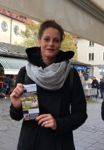 Munich resident Simone showing the flyer she read.