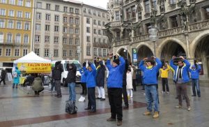 Group exercises at Marienplatz in Munich, German.