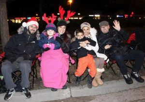 Maria (second from right), her husband (first from right), and their entire family praised the Tian Guo Marching Band.