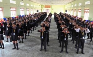 High school students in an Indian state near the Myanmar border in India learn the Falun Dafa exercises in July 2016.