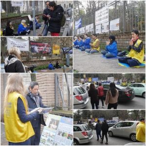 Falun Gong practitioners catch the attention of passersby, including Chinese tourists and reporters.