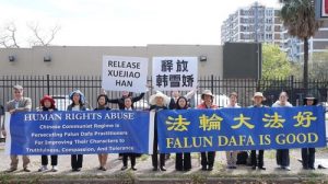 Practitioners hold a press conference in front of the Chinese Consulate in Houston, Texas.