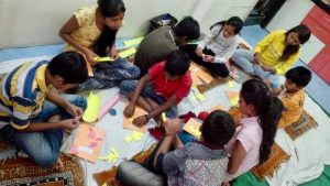 Making paper lotus flowers.