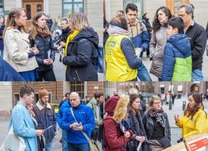 Tourists and residents talk with practitioners about Falun Dafa.