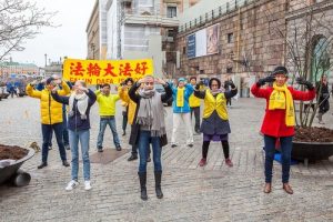 Group exercises at the public square of Mynttorget in Stockholm, Sweden, on April 8, 2017.