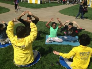 Learning the Falun Gong sitting meditation exercise at Purdue University's Spring Fest.