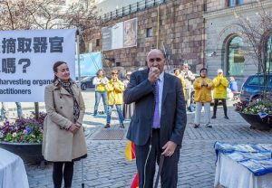 Dr. Harold King offers his support at the rally in Sweden.