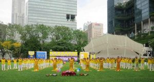 Practitioners do the exercises together in Hong Lim Park on May 2 to celebrate World Falun Dafa Day.