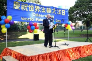 Andrew Wilson, former city council member for the City of Parramatta, participates in the rally to express his support for Falun Gong.