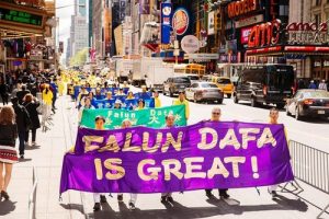 Practitioners from different cultures attended the march in New York City on May 12 to celebrate the 18th annual World Falun Dafa Day.