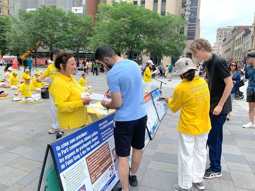 People sign the petition.

