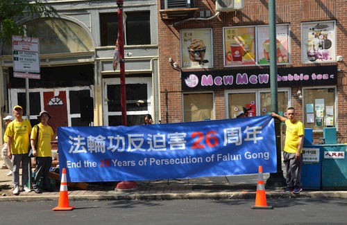 Falun Dafa practitioners held a rally in Chinatown on June 28.
