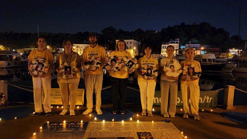 Candlelight vigil on the seafront opposite the Chinese Consulate in Istanbul on July 20

